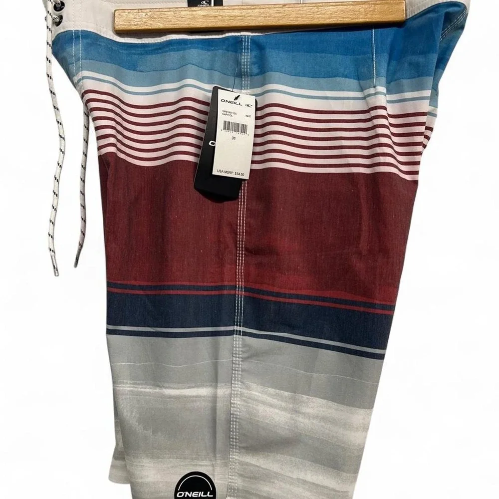 O'Neill horizontal stripes in blue, red, and gray boardshorts - size 31